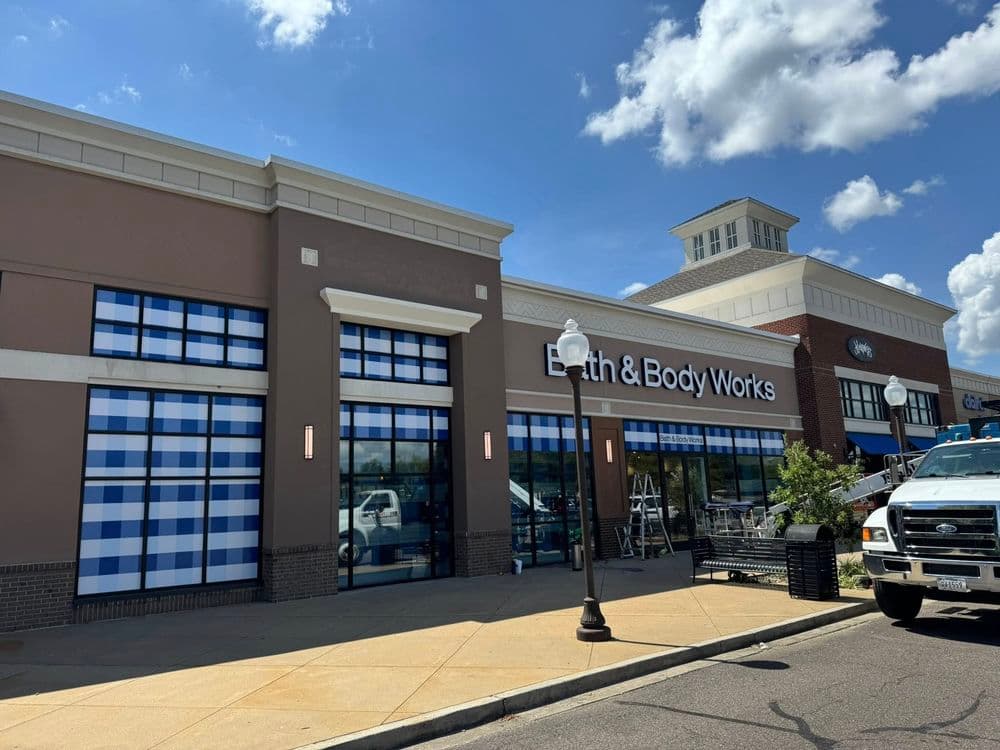 Bath & Body Works storefront featuring blue checkered windows and modern design exterior.